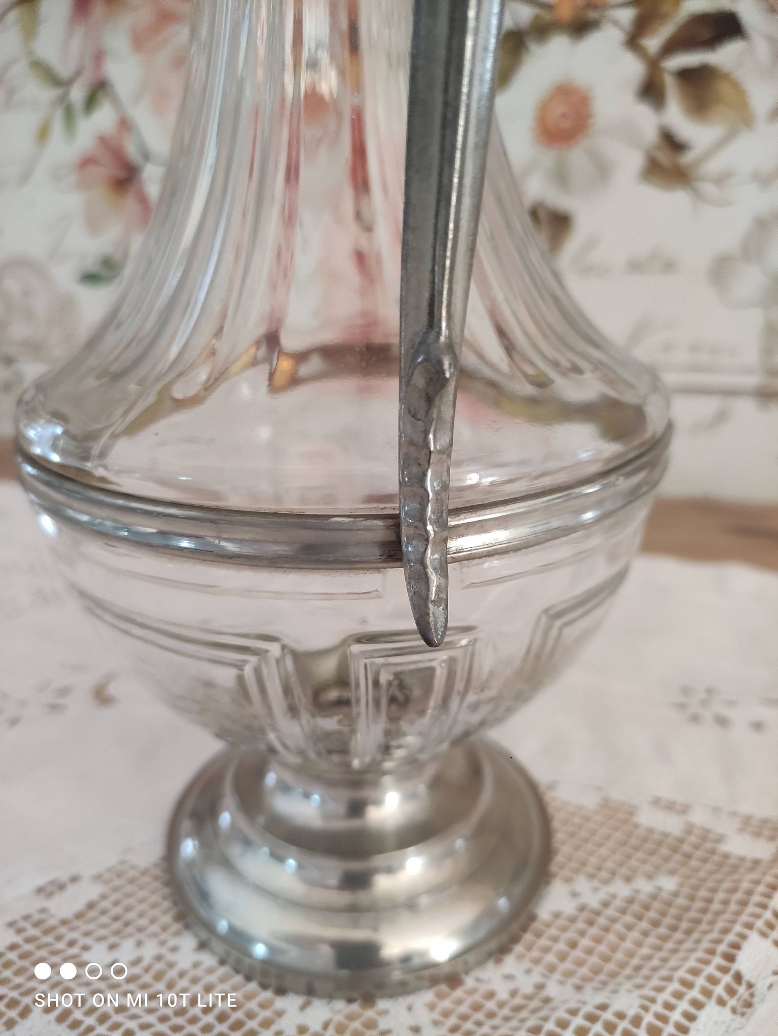 Old water decanter in curved glass and tin Art Nouveau style