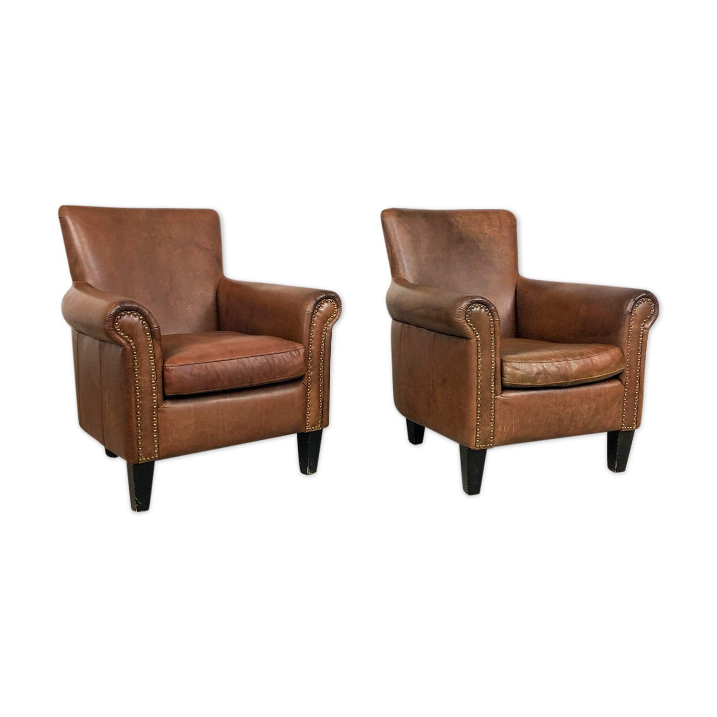 Ensemble de deux fauteuils en cuir vintage