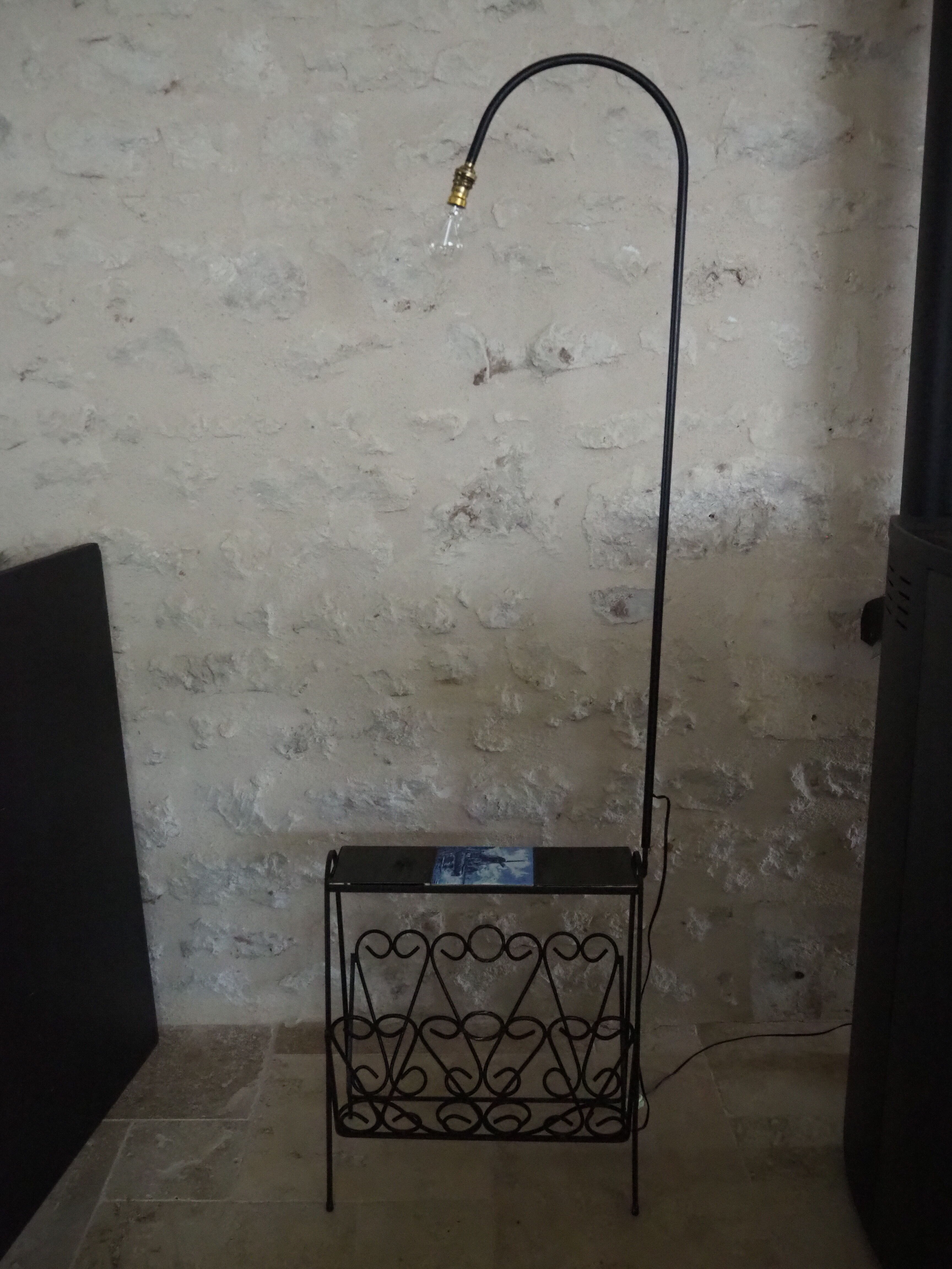 1970s black wrought iron ironing board with enamelled tiles