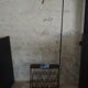 1970s black wrought iron ironing board with enamelled tiles