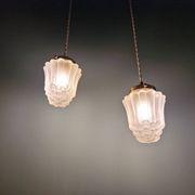 Pair of Art Deco Skyscraper-style pendant lights in frosted glass, 1920-30