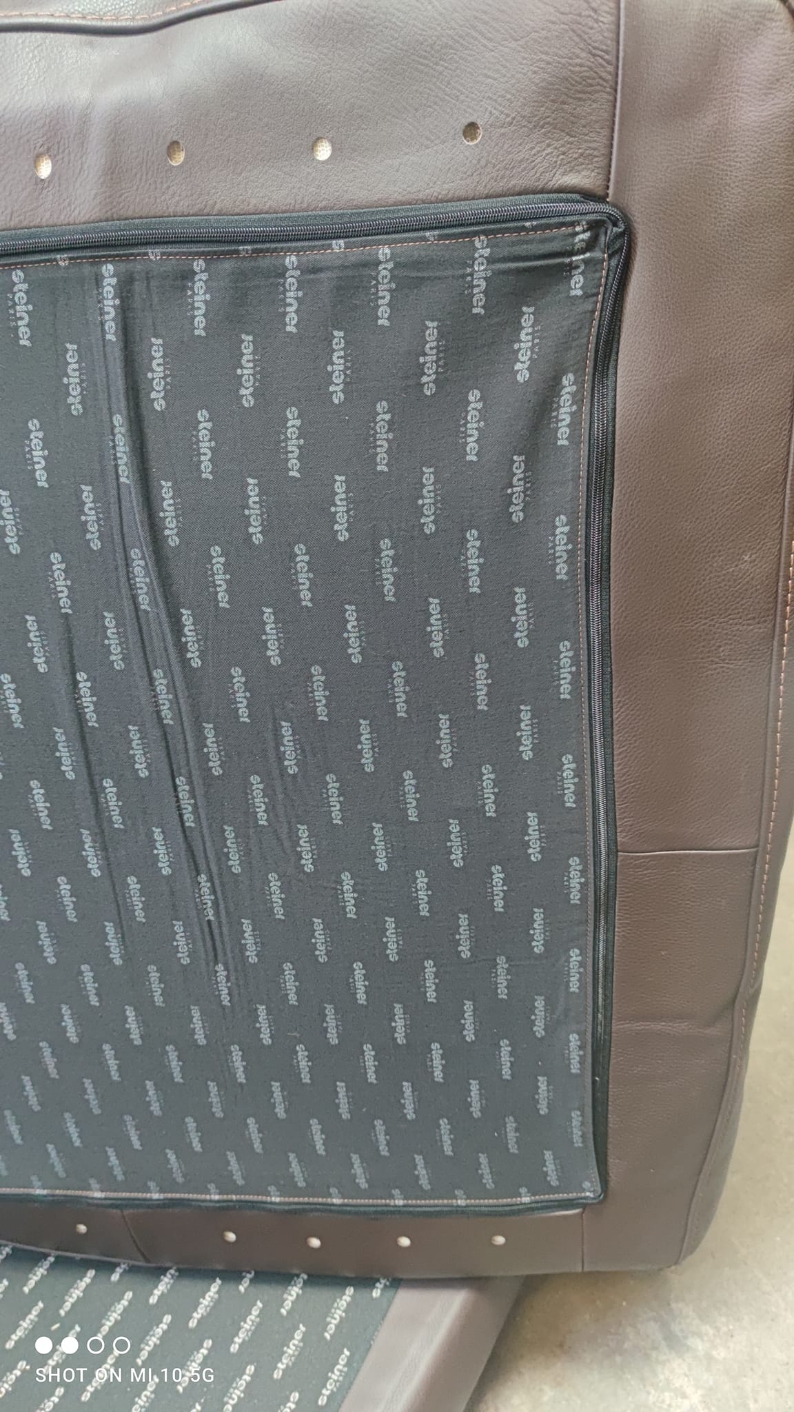 Four-seater sofa in dark brown leather from Steiner by designer Pascal Daveluy, model