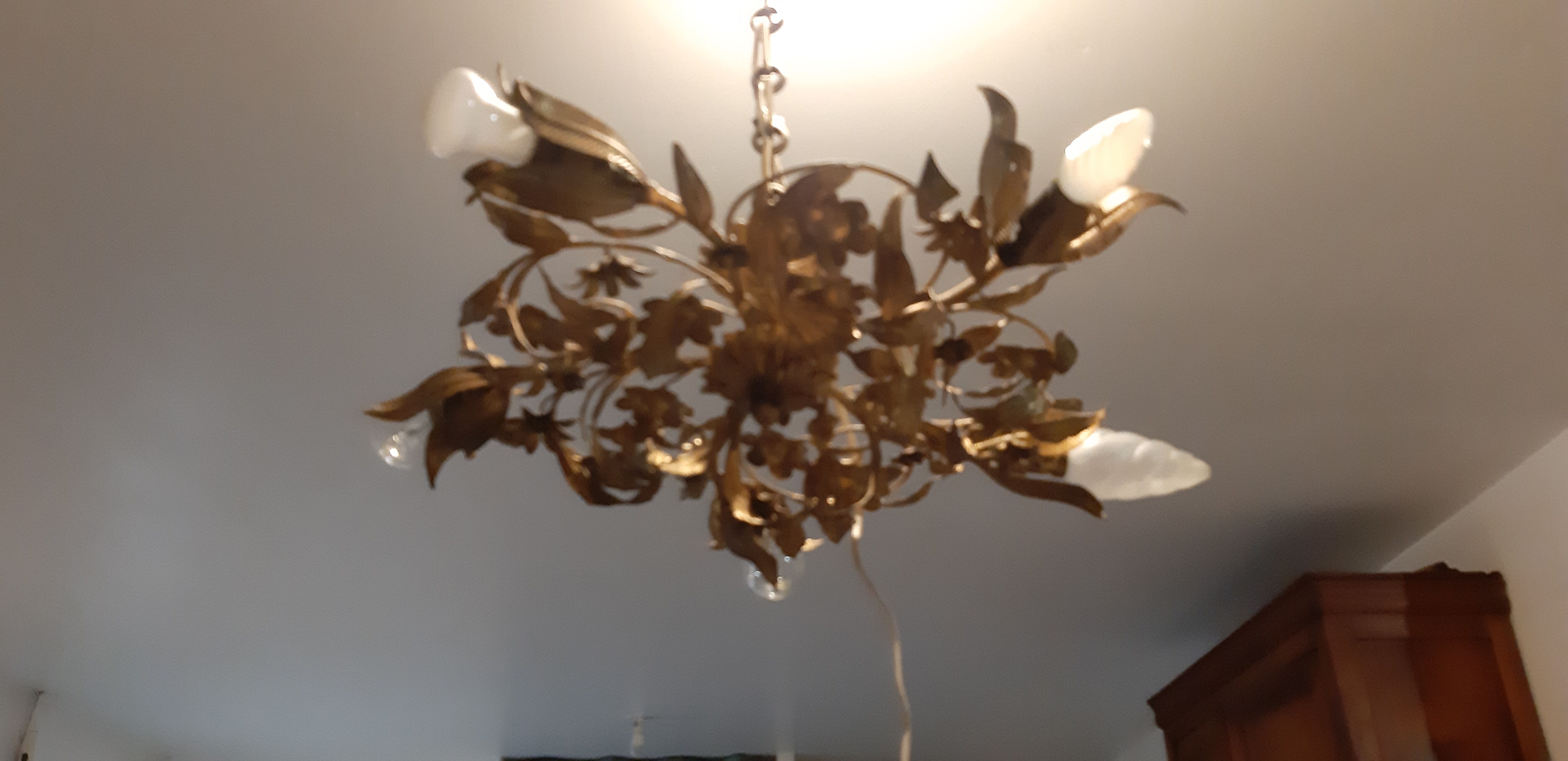Vintage chandelier in gilded metal