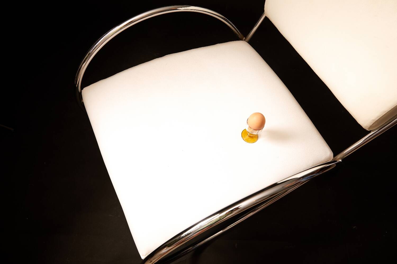 Chrome metal and white sky designer armchair