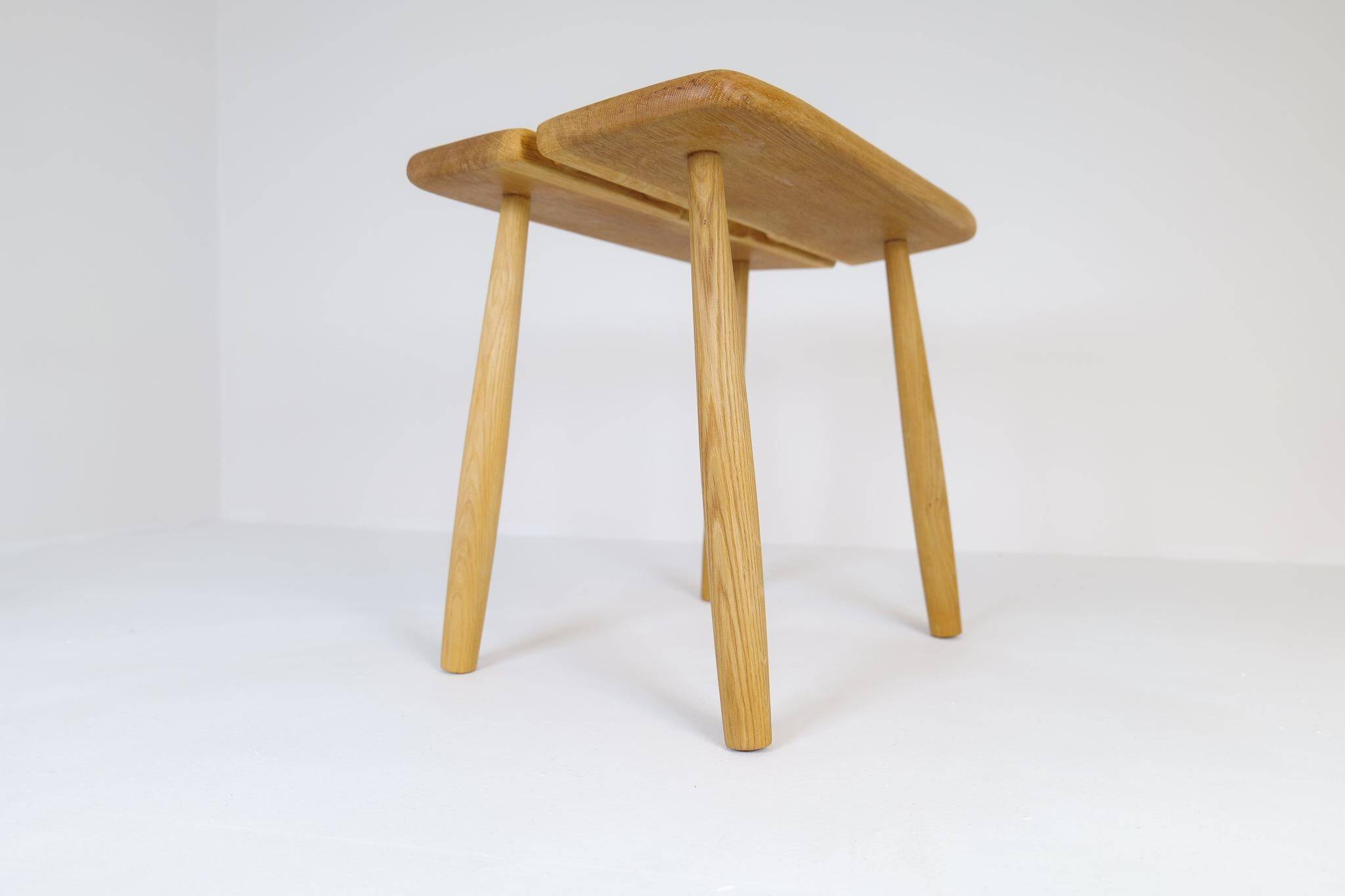 Sculptural mid-century stool in solid oak by Carl Gustaf Boulogner, Sweden, 1950s.