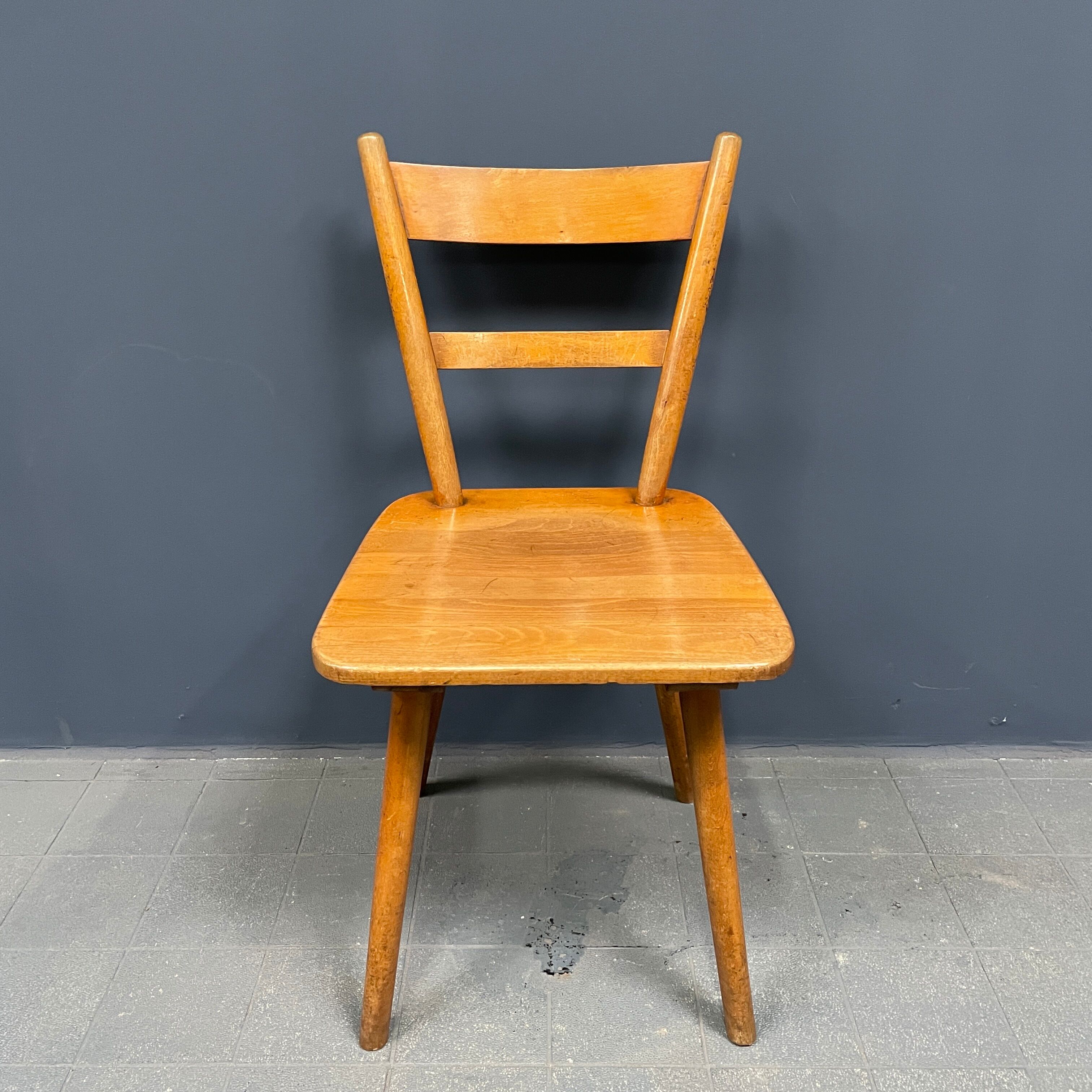 Set of eight german stick chairs from the 1950