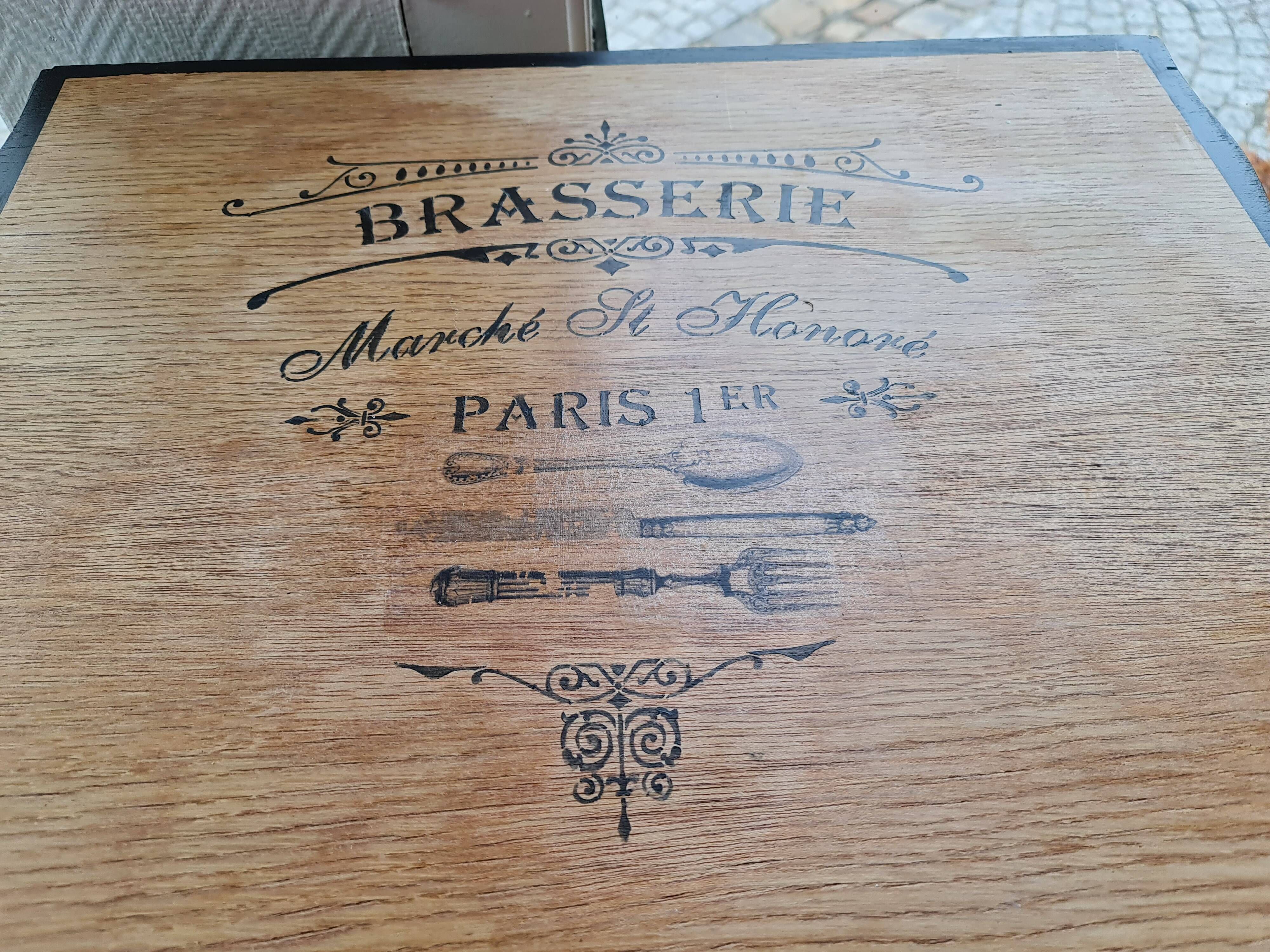 Raw oak and matte black storage cabinet on stencil top and transfer
