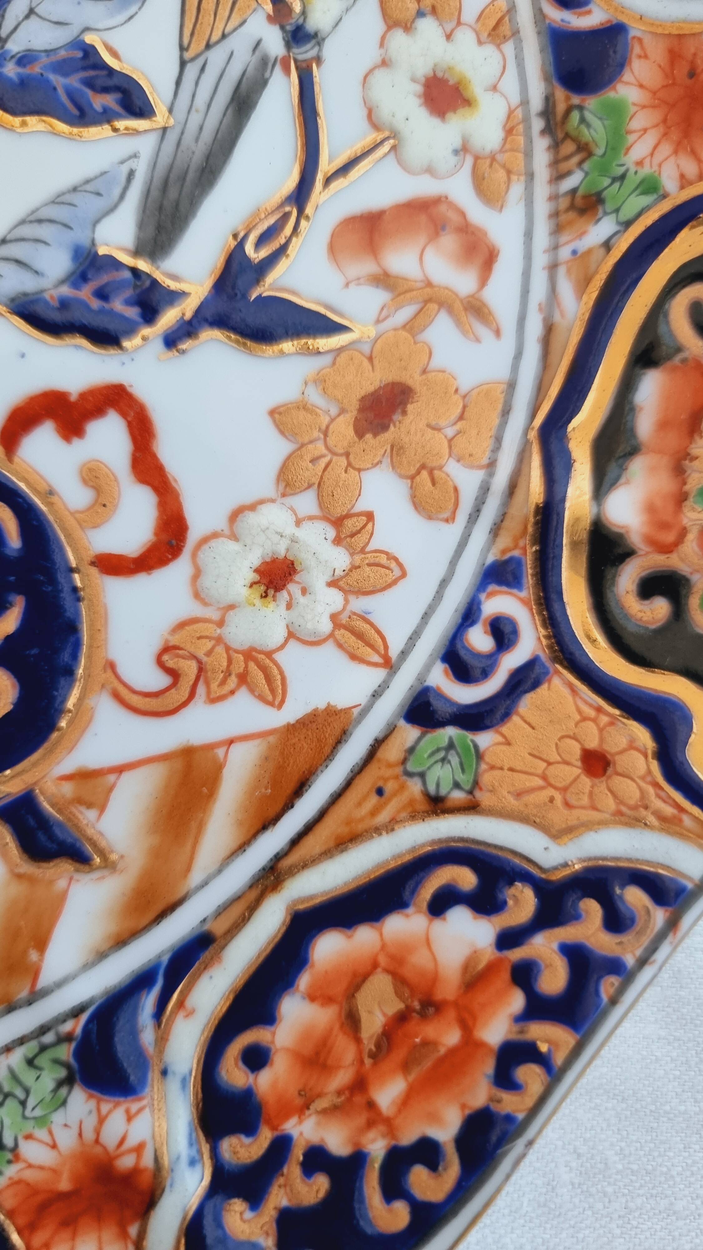 Imari-style porcelain plate, hand-painted, Japan, mid-20th century.