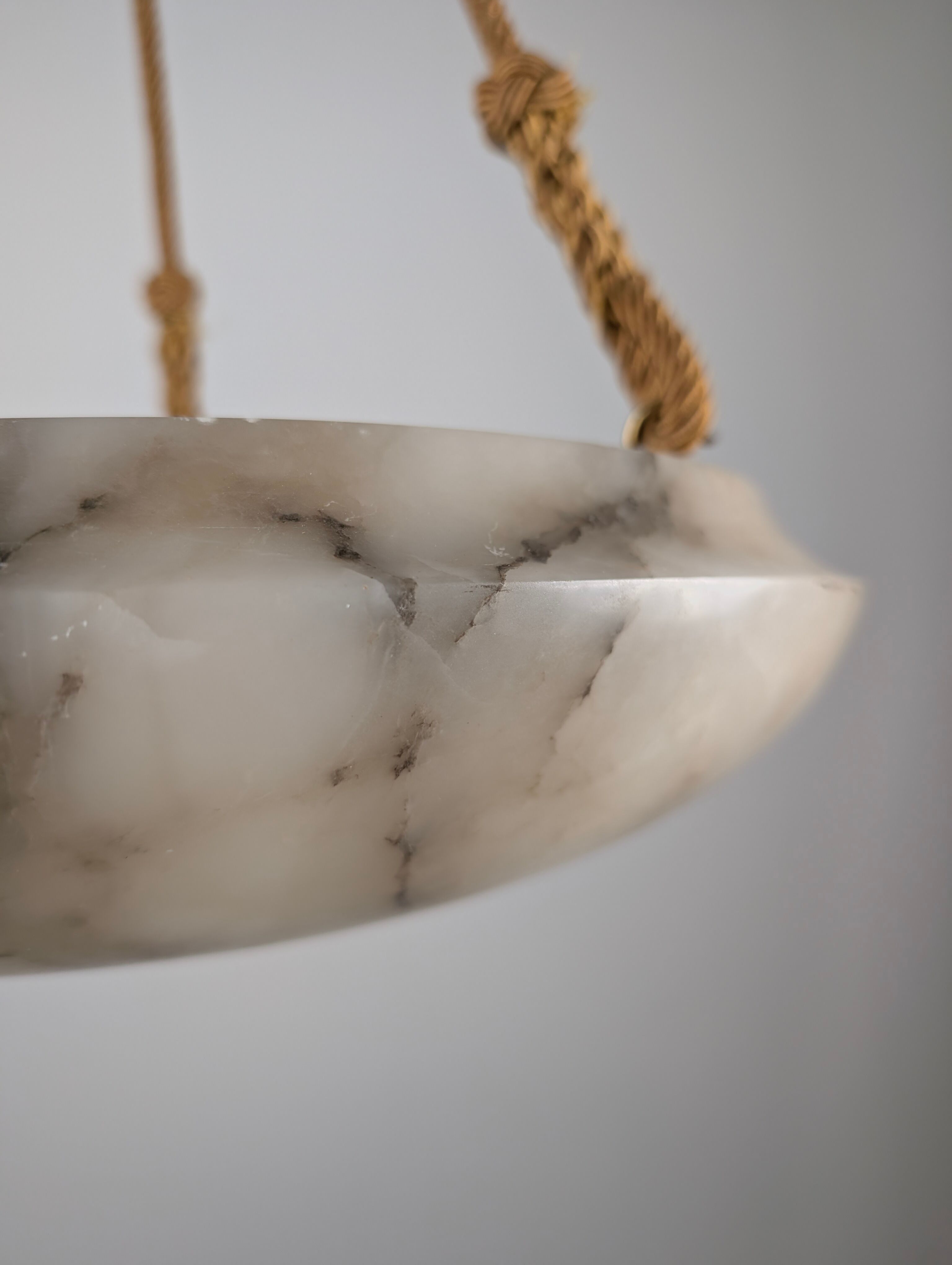 Timeless Art Deco pendant lamp in carved alabaster with black veins, 1920s