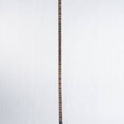 Indonesian construction element in carved wood with intertwined plant motifs mounted on a base (fri