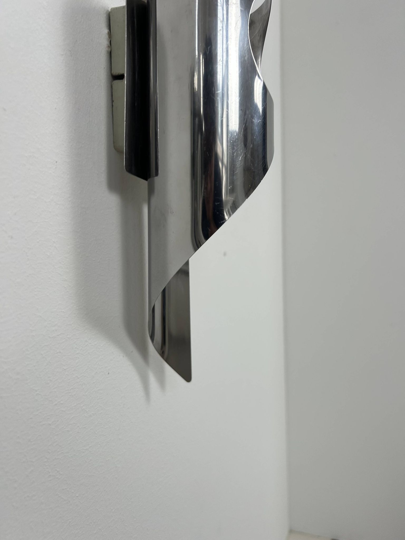 Pair of vintage wall lights, chrome metal, France, 1970.