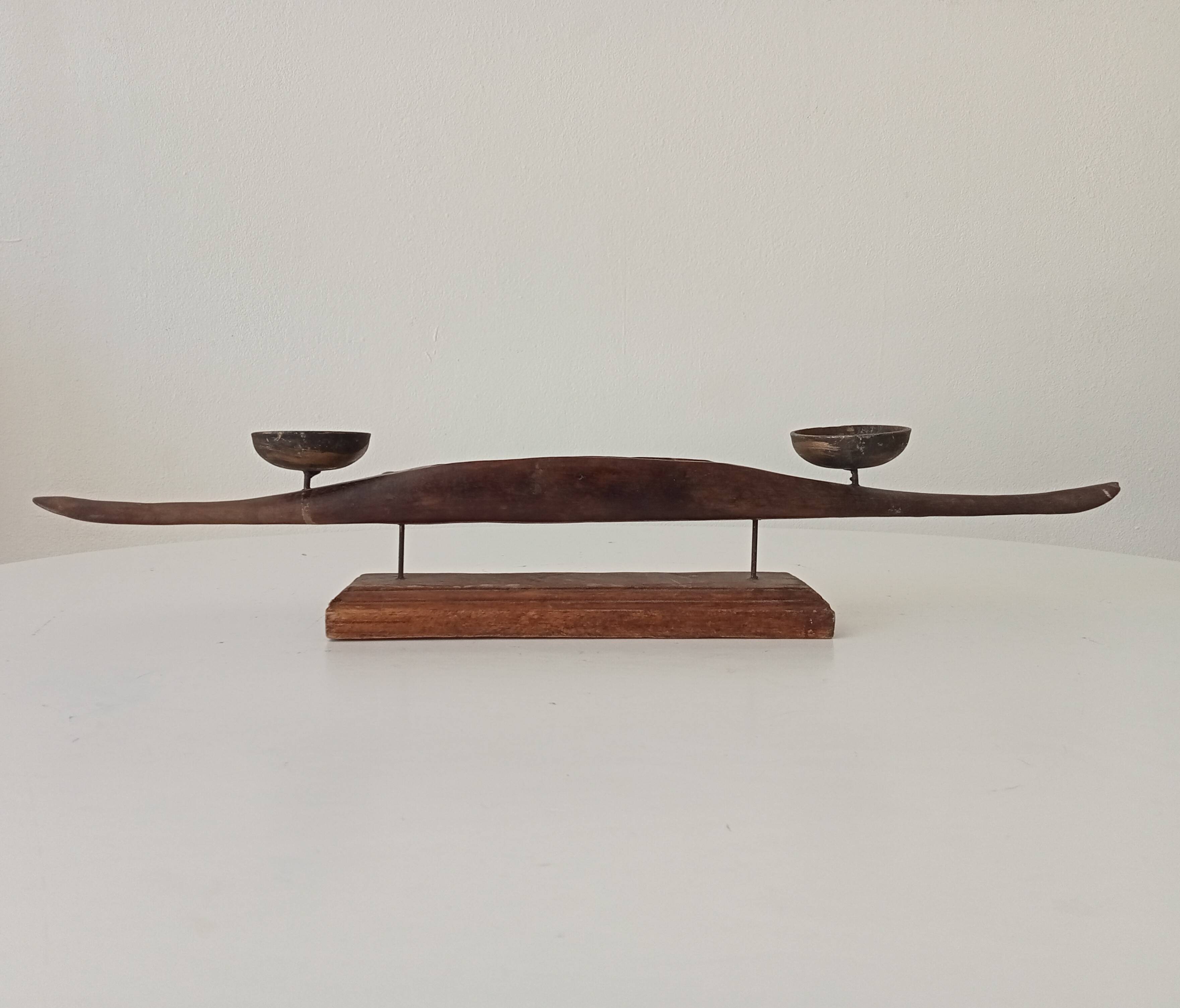 Vintage chandelier in solid carved teak.