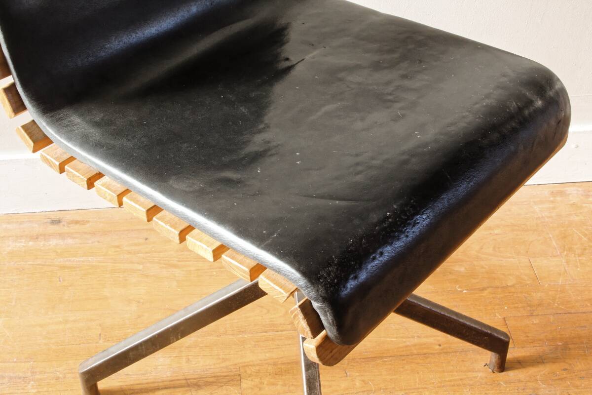 Handcrafted chair, laminated wood and leather