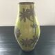 Large green vase with floral decoration