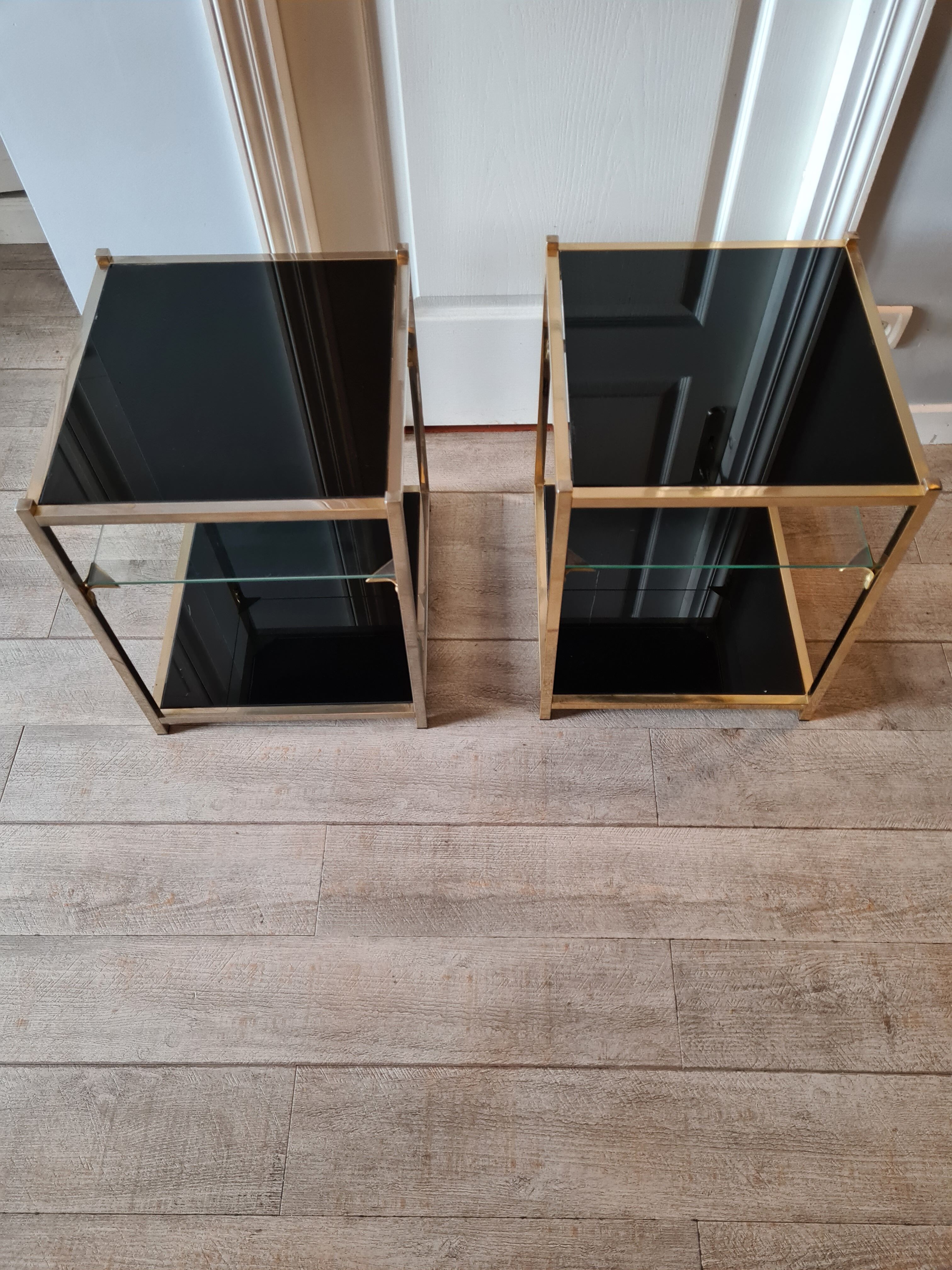 Pair of glass and brass sofa endsl