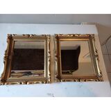 Pair of wood and gilded stucco mirrors
