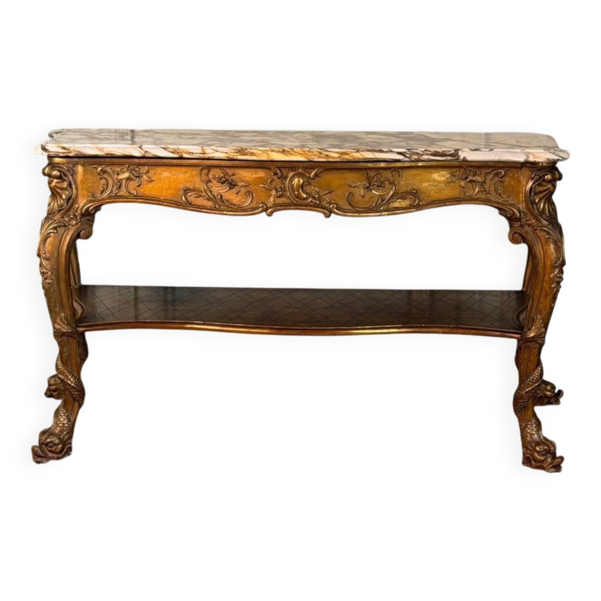 Golden wooden console, four legs adorned with sea monsters, purple breccia marble, around 1900.