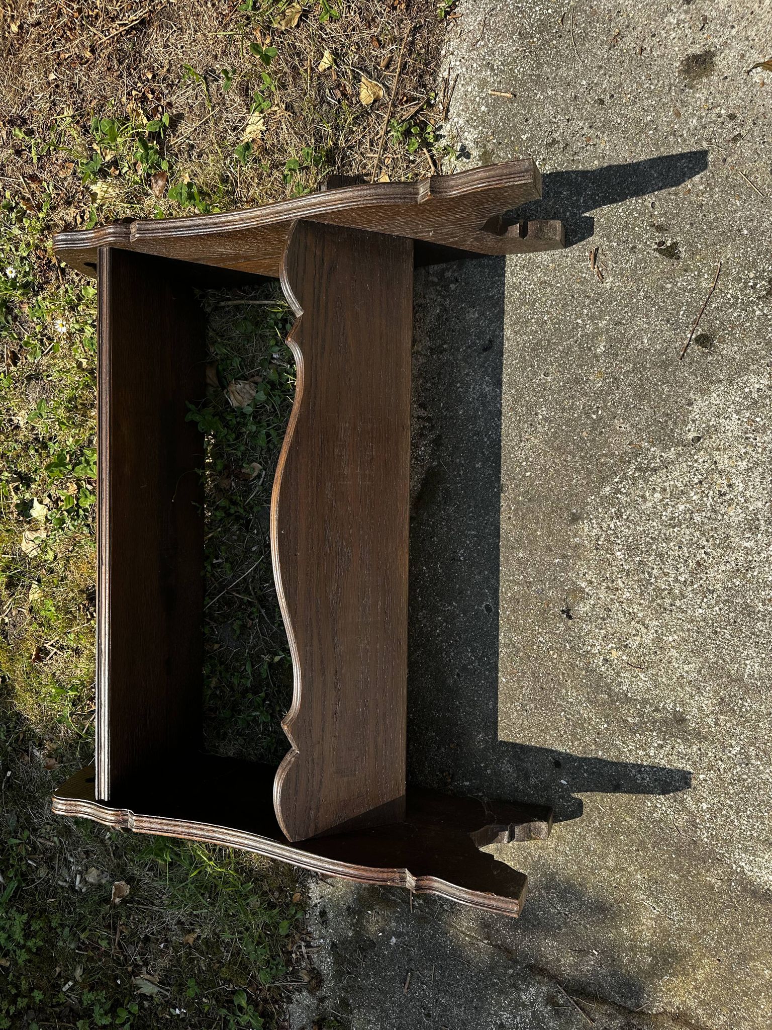 Small magazine rack / accent furniture in dark oak, late 19th century.