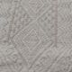 Hand-woven rug in natural wool
