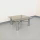 Square Italian vintage Space Age coffee table in smoked glass and metal.