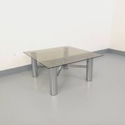 Square Italian vintage Space Age coffee table in smoked glass and metal.