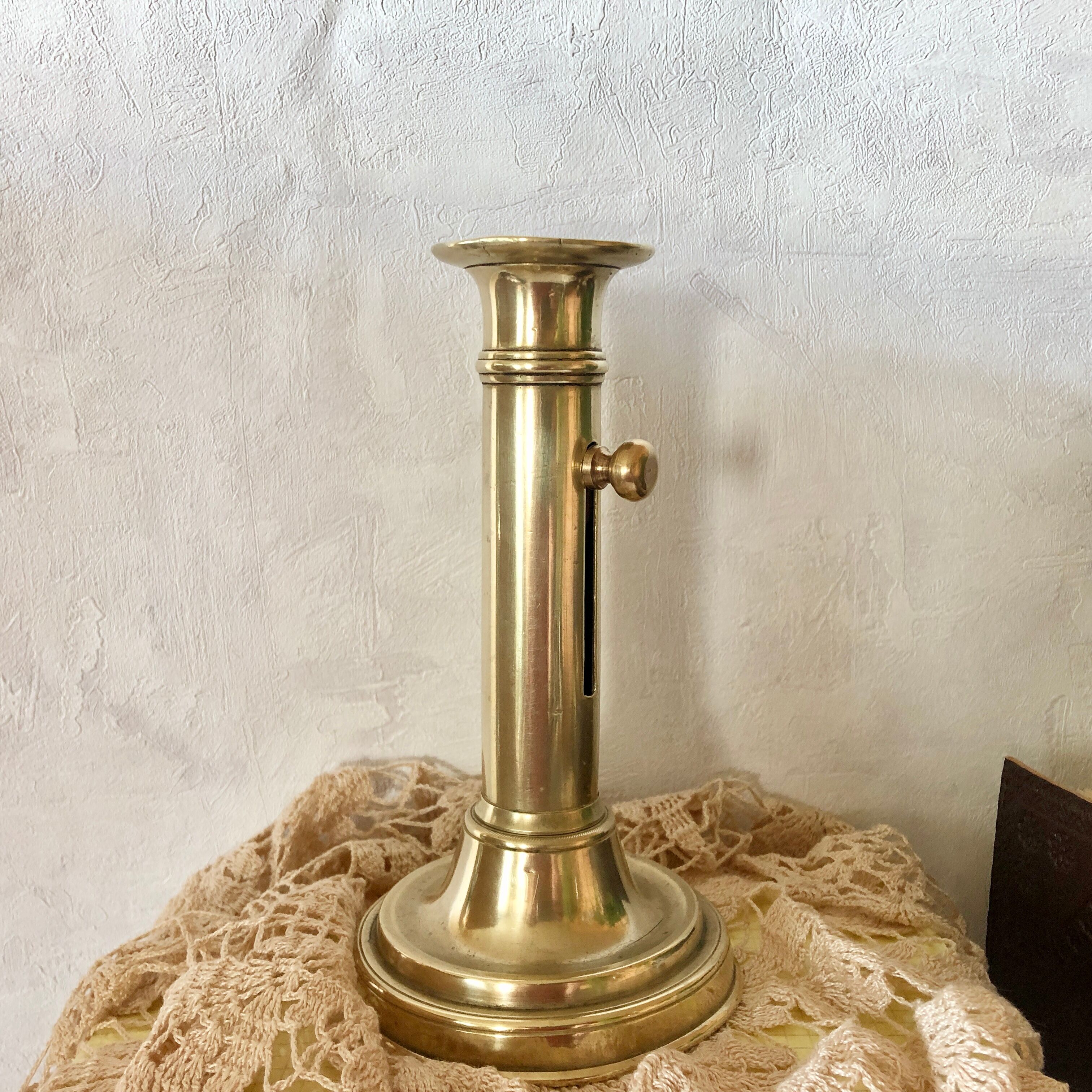 Golden copper candle holder with Belle Epoque pusher