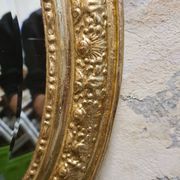 Miroir ovale doré, XIXe siècle