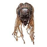 Chokwe Mwana Pwo mask in carved wood with a dark patina and rope hair