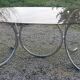 Designer table from the 70s, smoked glass top, chrome base