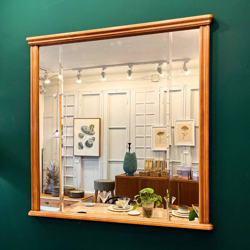 Miroir vintage avec cadre en bois sculpté