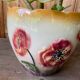 Earthenware cache pot with slip decoration.
