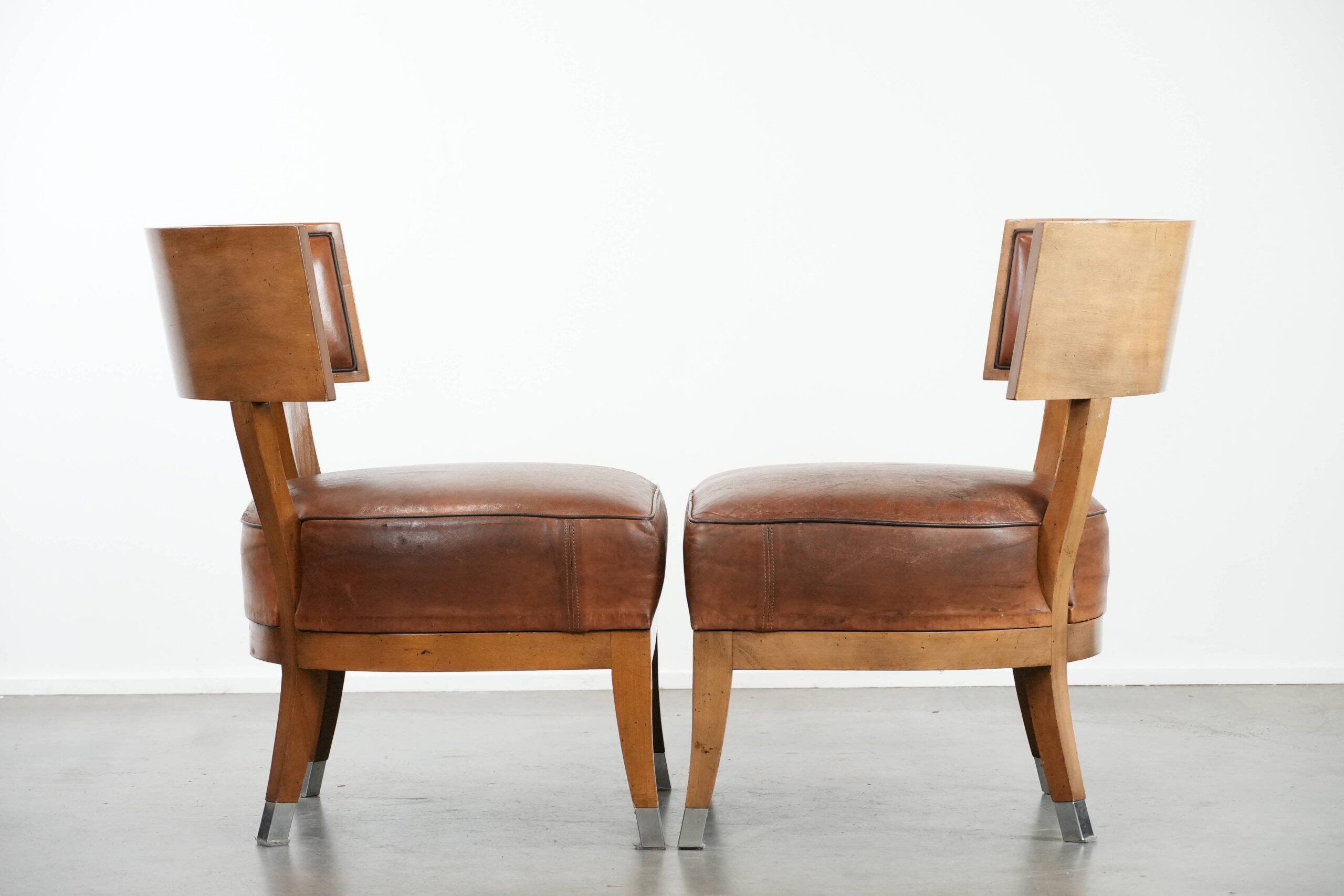 Set of 2 vintage design cocktail chairs/armchairs made of sheepskin leather