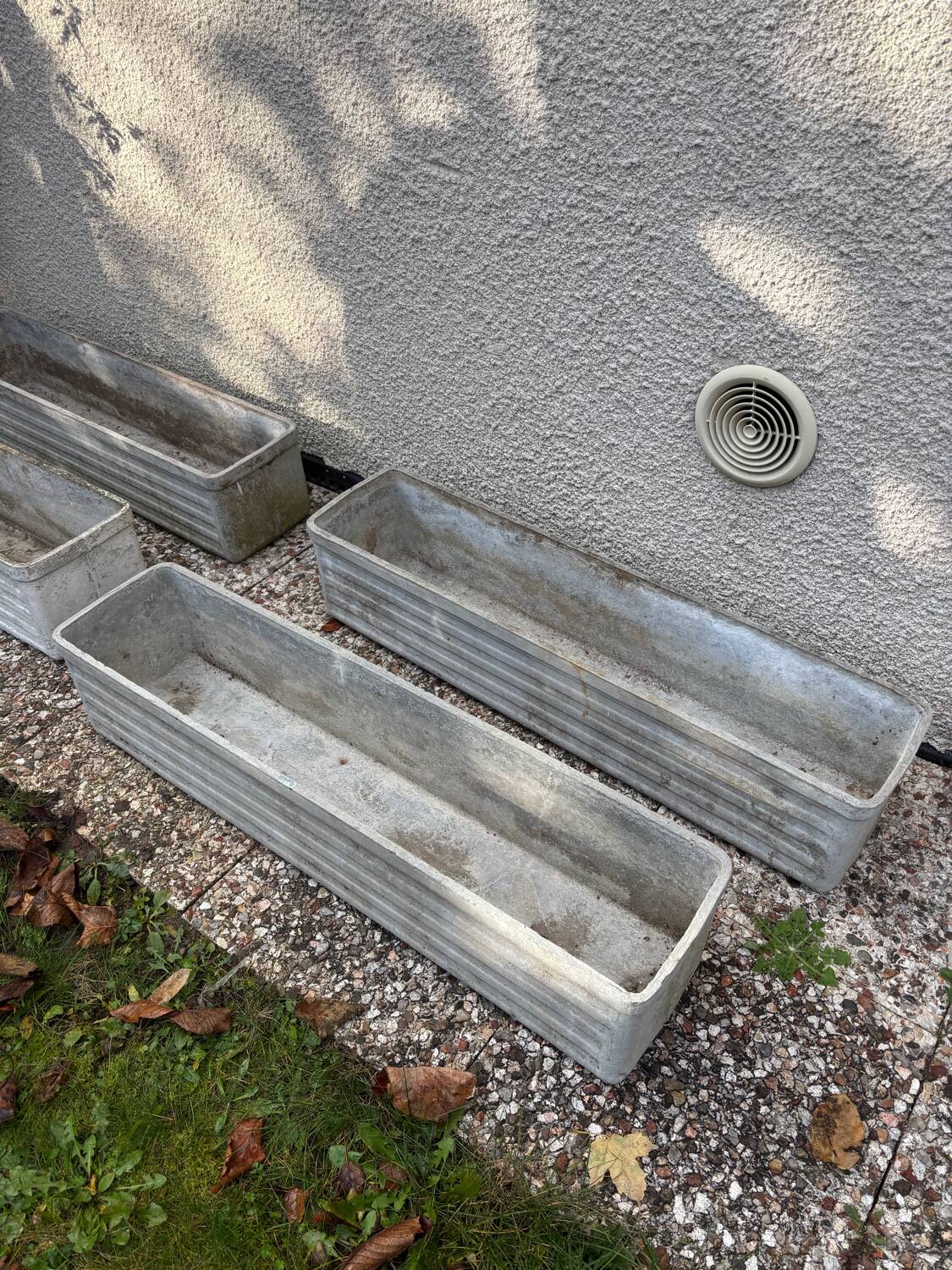 Set of 4 fibreglass planters by Willy Guhl