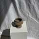 Small brutalist Indonesian footed pot H13 D15