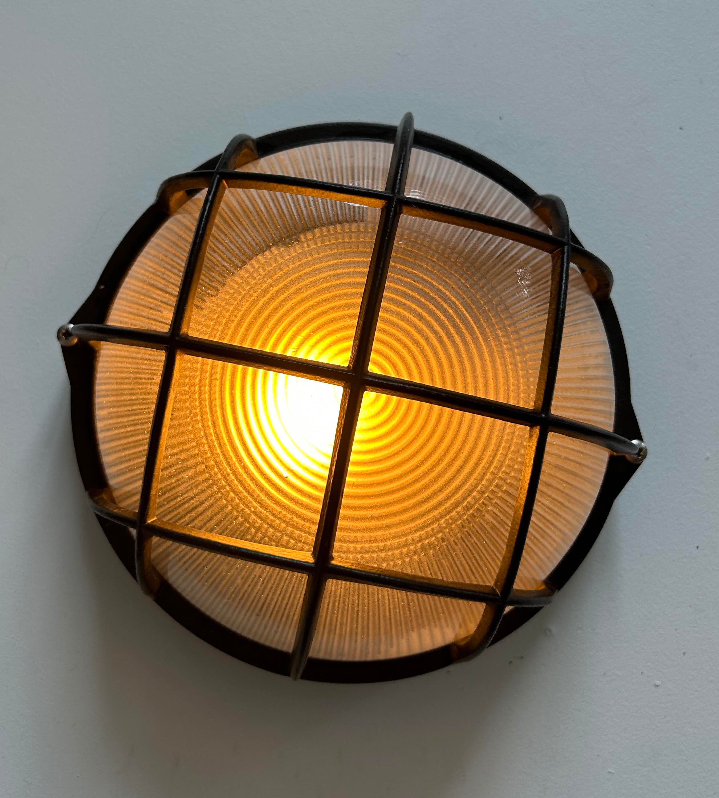 Vintage wall lamp, black metal and ridged glass, France 1980.