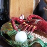 Plate in old barbotine with lobster