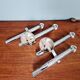 Pair of chromed metal wall lights, design Gaetano Sciolari, 1970s
