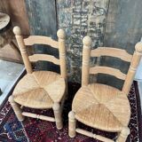 Pair of Dudouyt straw chairs