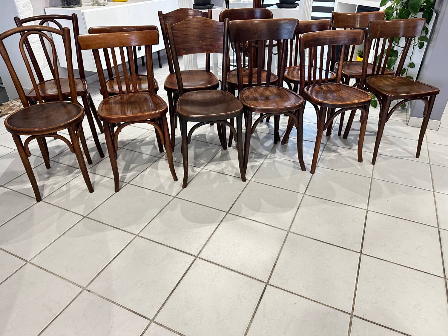 Set of 12 mismatched bistro chairs Baumann & Fischel 1930