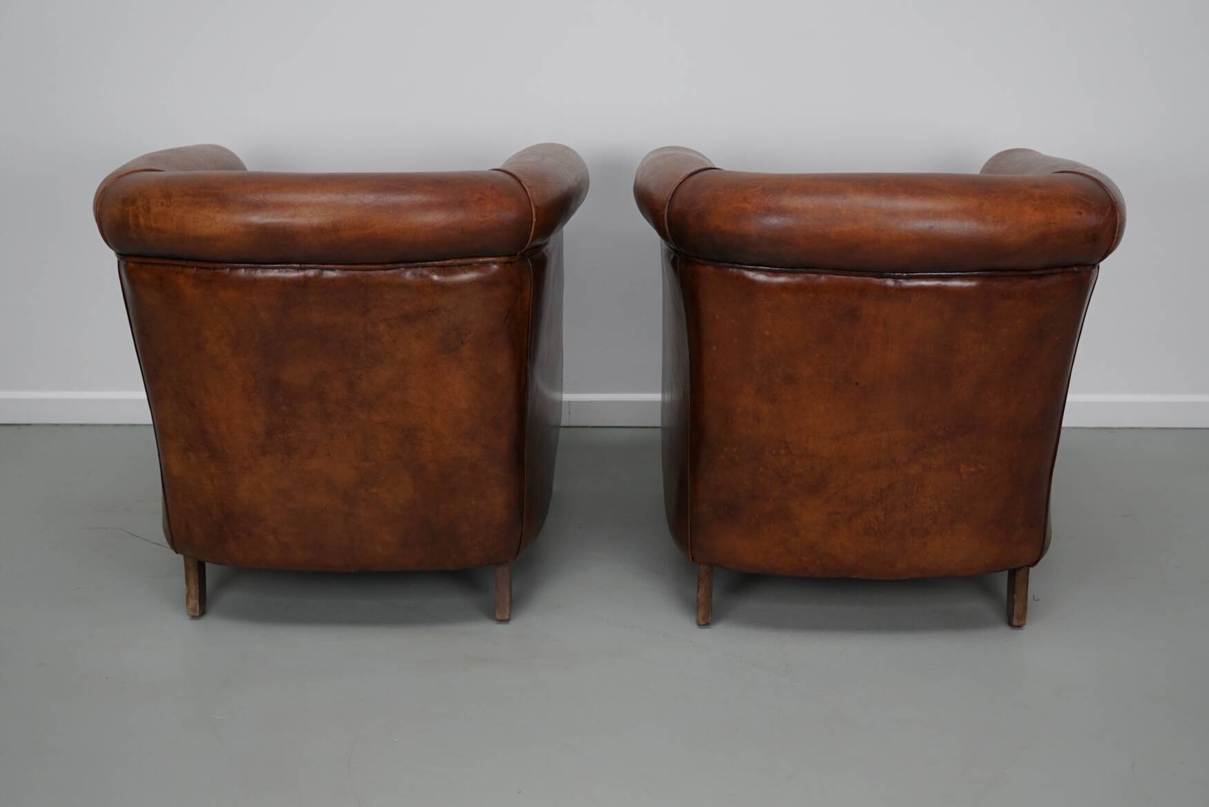 Vintage Dutch cognac coloured leather club chair, set of 2 with footstool