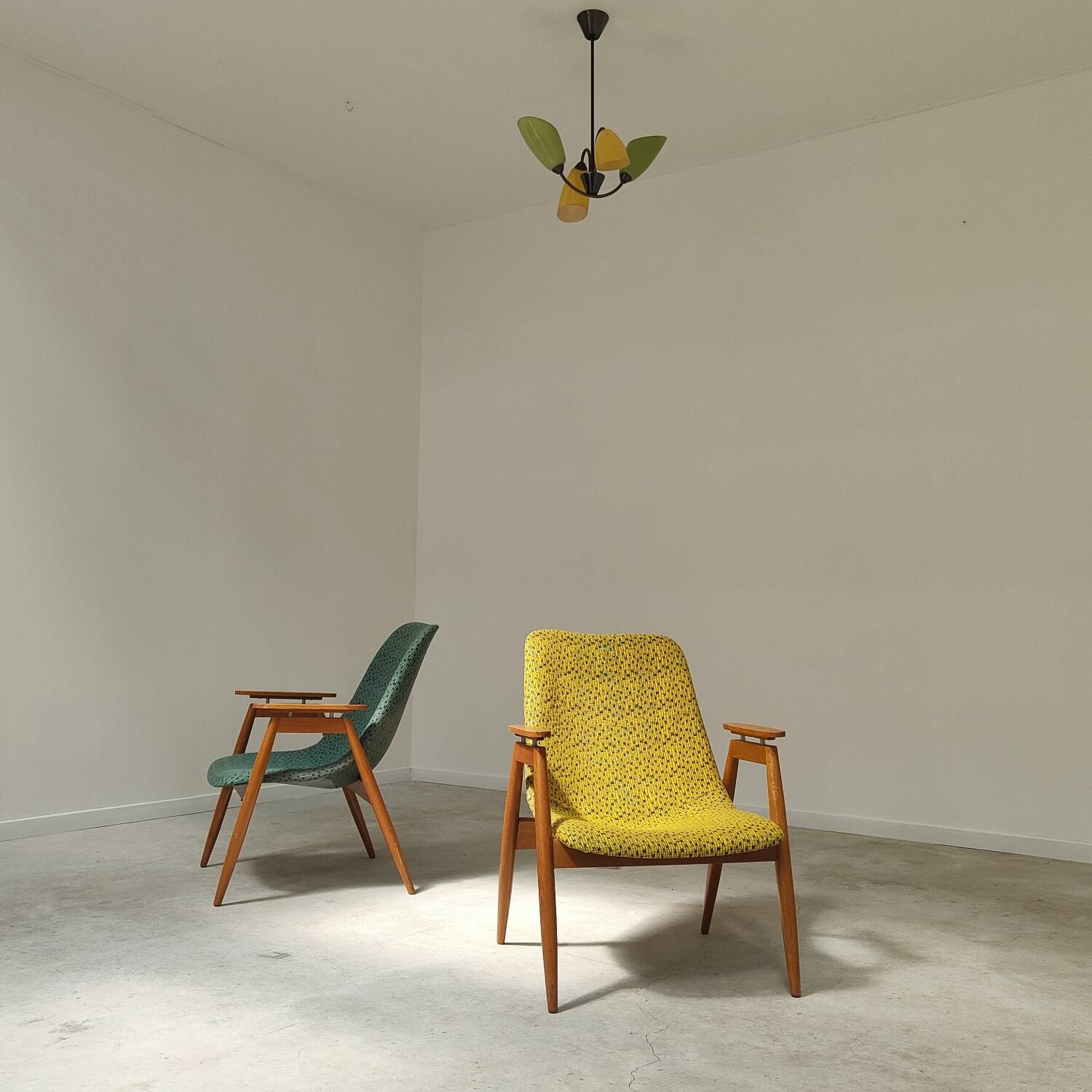 Pair of yellow and green resin and wood armchairs by Miroslav Navratil