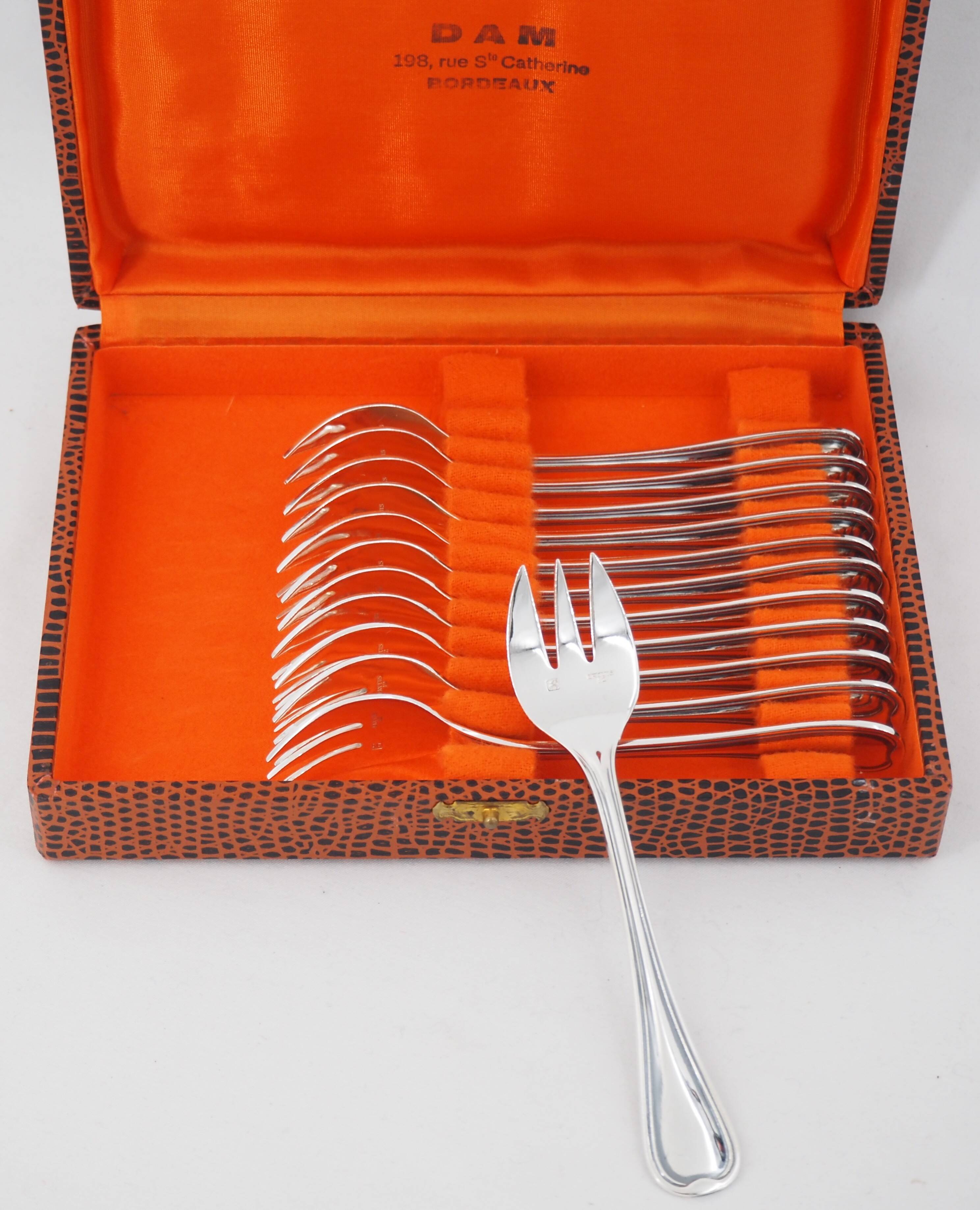 Ercuis Auteuil, 12 silver-plated oyster forks, in perfect condition.