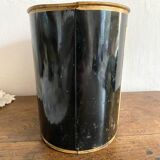 Metal wastebasket with bird decoration