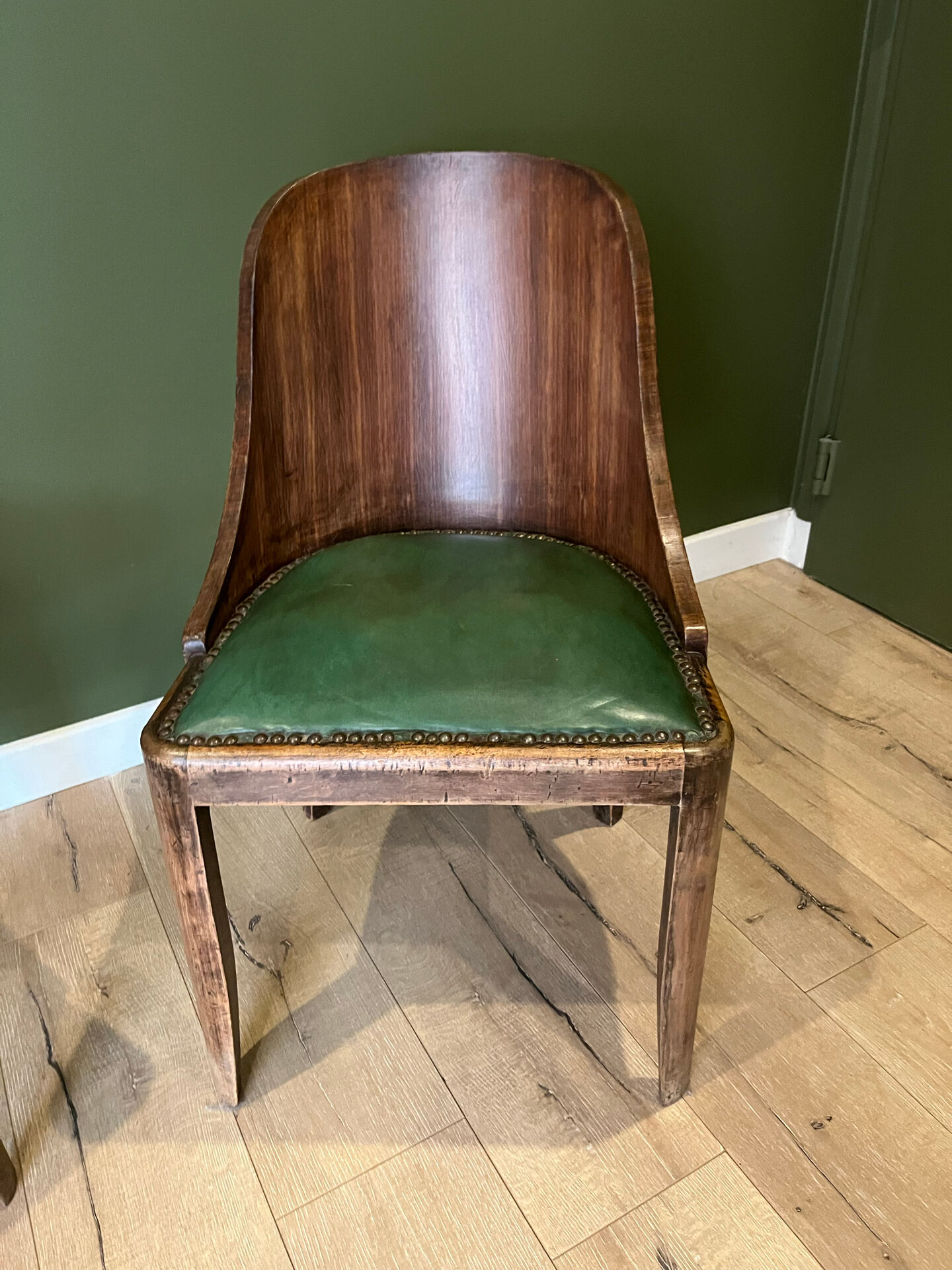 Pair of green leather gondola chairs Art Deco by De Coen