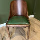 Pair of green leather gondola chairs Art Deco by De Coen