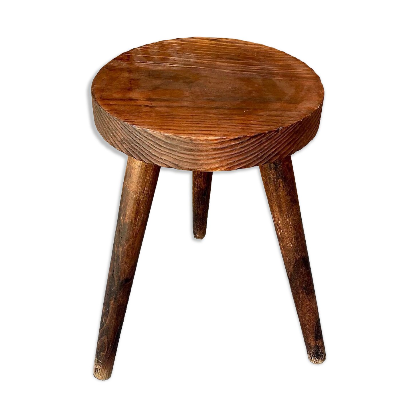 Wooden tripod stool.