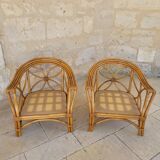 Two large rattan armchairs