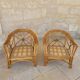 Two large rattan armchairs