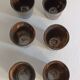 A bottle and six ceramic cups by Gérard Hofmann Vallauris 1950.