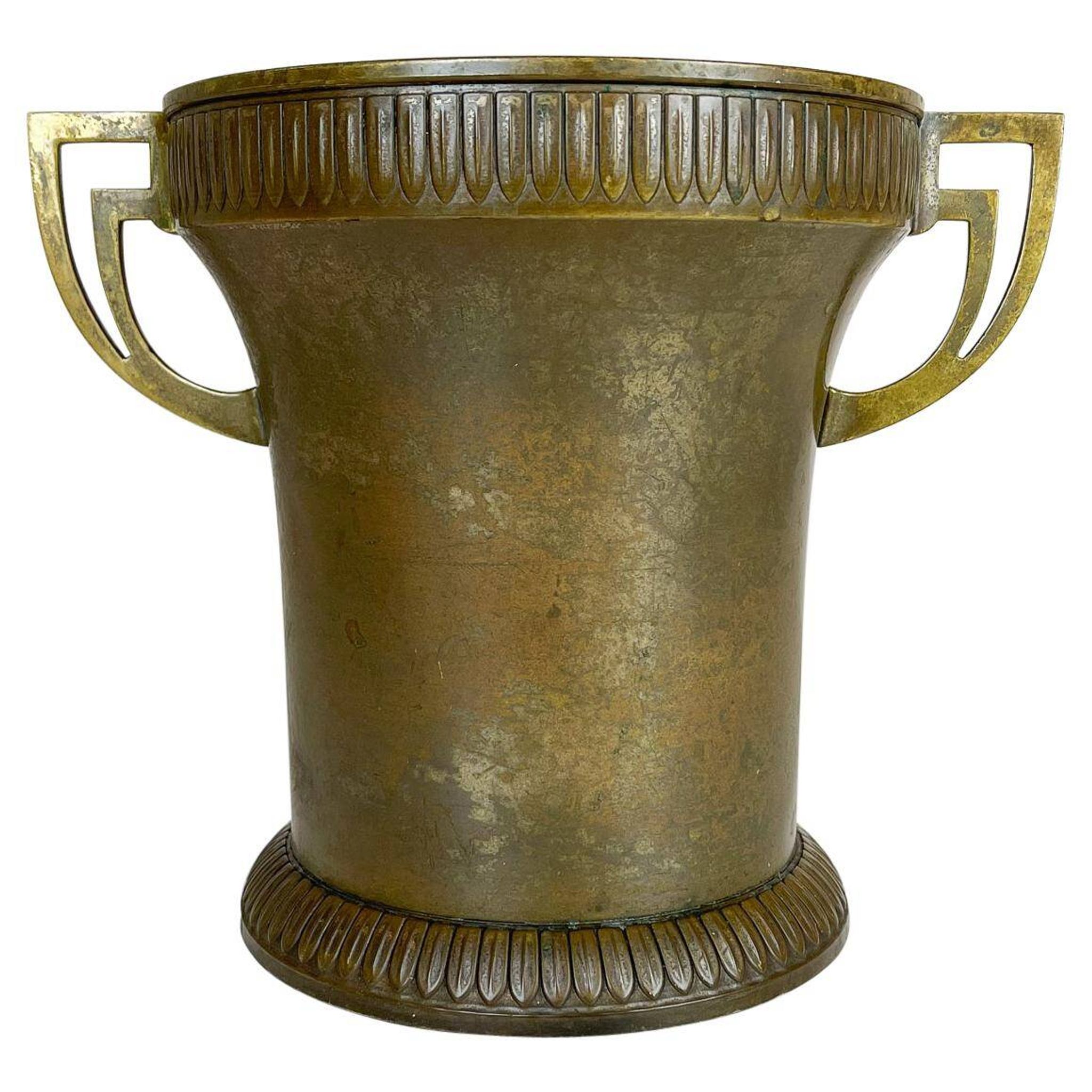 Art Deco champagne cooler in copper and brass with relief patterns, Sweden, 1930s.